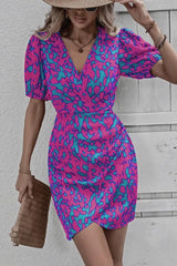 Virella – Bold Wrap Mini Dress