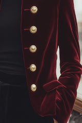 Chic Velvet Jacket with Bold Gold Accents